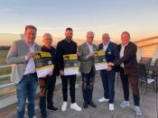 (v. l.): Bürgermeister Ulrich Berger, Stefan Brand (Techniker Krankenkasse), Daniel Engelbrecht (Keynote-Speaker) Ferdinand Klingenthal (Textilhäuser F. Klingenthal GmbH), Roland Hüser (Geschäftsführer Flughafen Paderborn-Lippstadt) und Sascha Wiczynski (Organisator Klingenthal Salzkotten Marketing)